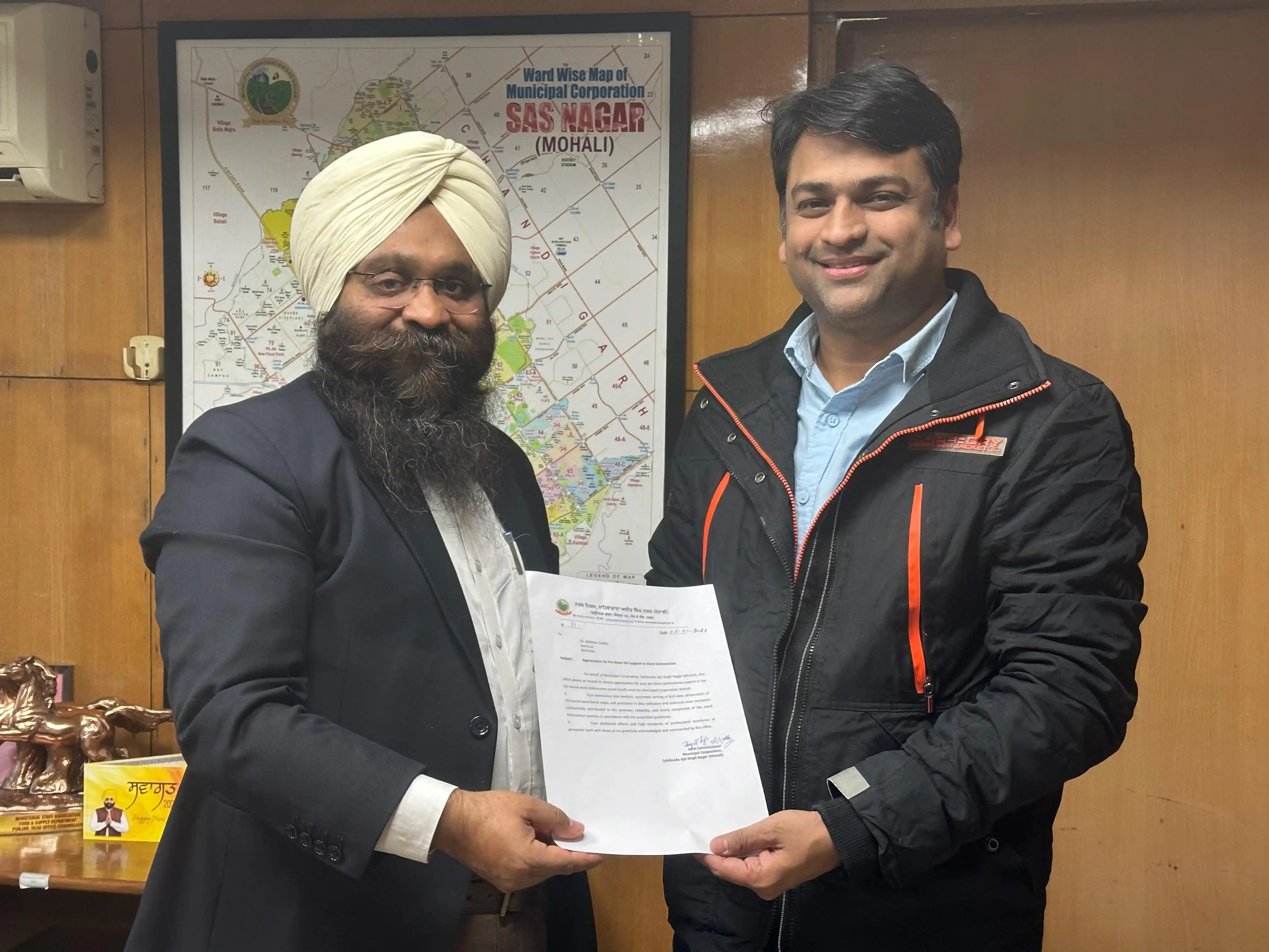 Abhinav Gupta receiving an appreciation letter from Municipal Corporation, Mohali